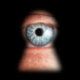 eye peeking through key hole